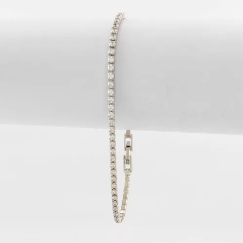 Ezüstszínű antiallergén karkötő fehér kristályokkal