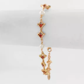   Aranyszínű antiallergén karkötő bordó kristályokkal és tekla gyönggyel