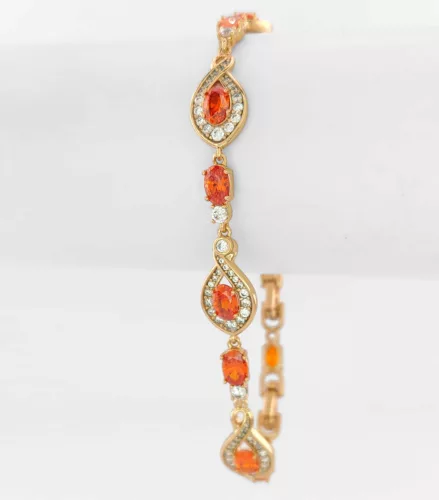 Aranyszínű antiallergén karkötő piros kristályokkal