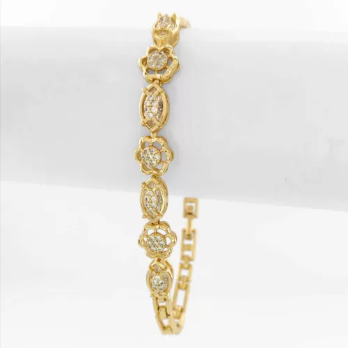 Aranysárga színű antiallergén virág karkötő fehér kristályokkal