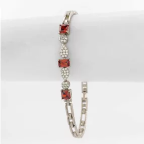 Ezüstszínű antiallergén karkötő bordó kristályokkal