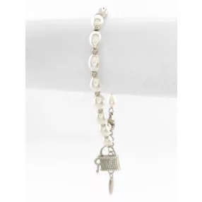   Ezüstszínű antiallergén karkötő tekla gyöngy díszítéssel