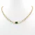 Aranyszínű nemesacél nyaklánc smaragdzöld és fehér kristályokkal