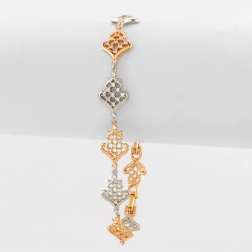 Arany-ezüstszínű antiallergén karkötő fehér kristályokkal