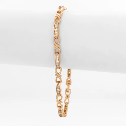 Aranyszínű antiallergén karkötő fehér kristályokkal