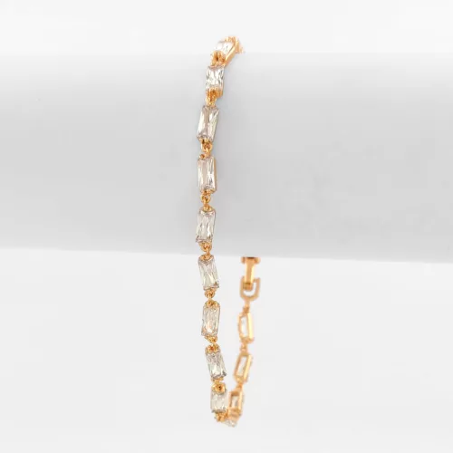 Aranyszínű antiallergén karkötő fehér kristályokkal