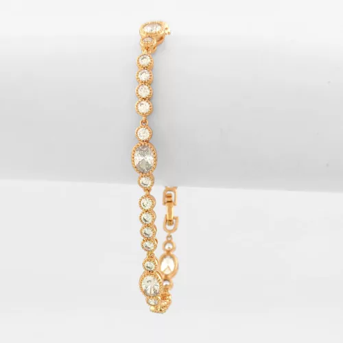 Aranyszínű antiallergén karkötő fehér kristályokkal