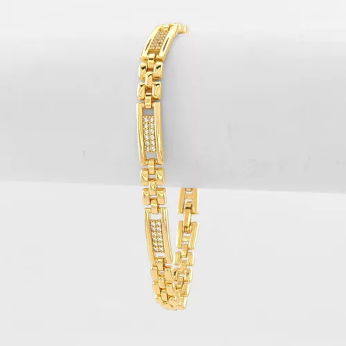 Aranysárga színű antiallergén karkötő fehér kristályokkal