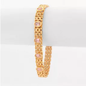   Aranyszínű antiallergén karkötő rózsaszín kristályokkal