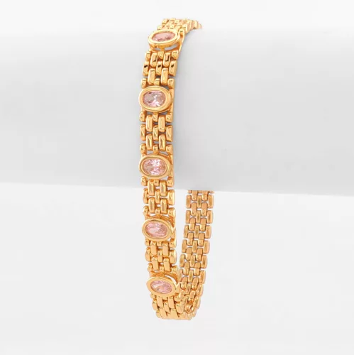 Aranyszínű antiallergén karkötő rózsaszín kristályokkal