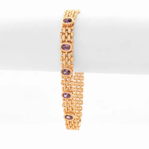 Aranyszínű antiallergén karkötő lila kristályokkal