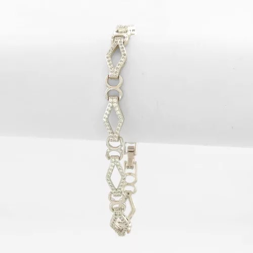 Ezüstszínű antiallergén karkötő fehér kristályokkal