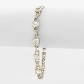 Ezüstszínű antiallergén karkötő fehér kristályokkal