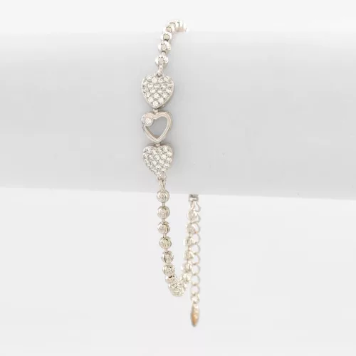Ezüstszínű antiallergén szívecske karkötő fehér kristályokkal