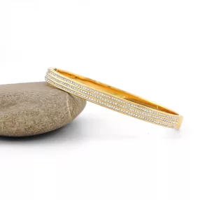 Aranyszínű nemesacél karperec fehér kristályokkal