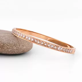 Rose gold színű nemesacél karperec fehér kristályokkal