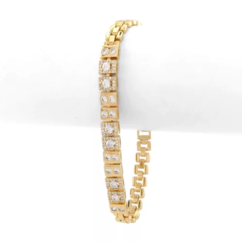 Aranysárga színű antiallergén karkötő fehér kristályokkal