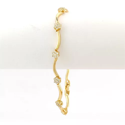 Aranysárga színű antiallergén virág karkötő fehér kristályokkal