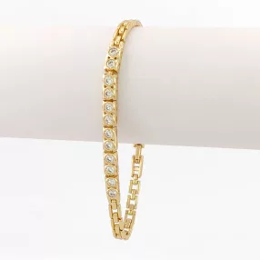   Aranysárga színű antiallergén karkötő fehér kristályokkal