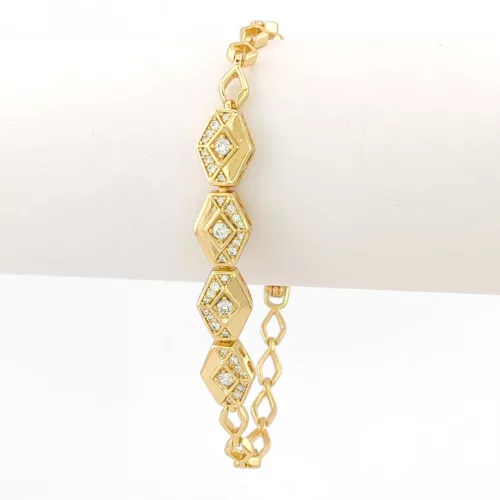 Aranysárga színű antiallergén karkötő fehér kristályokkal