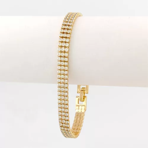 Aranysárga színű antiallergén karkötő fehér kristályokkal