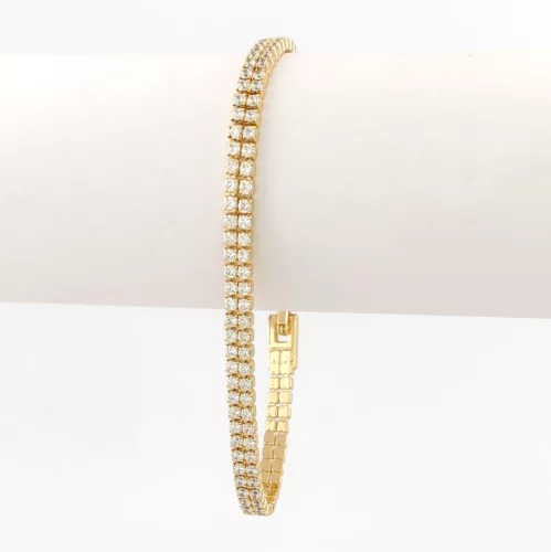 Aranysárga színű antiallergén karkötő fehér kristályokkal