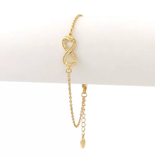 Aranysárga színű antiallergén végtelen karkötő fehér kristályokkal