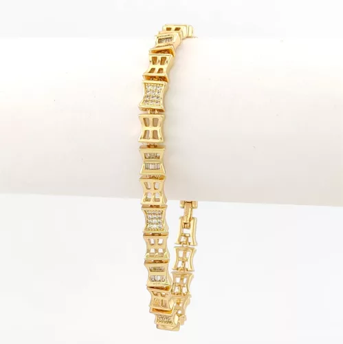 Aranysárga színű antiallergén karkötő fehér kristályokkal