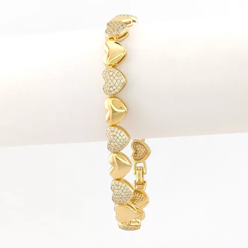 Aranysárga színű aniallergén szívecske karkötő fehér kristályokkal