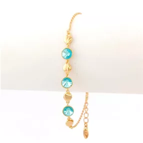   Égszínkék Swarovski kristállyal díszített aranyszínű antiallergén karkötő