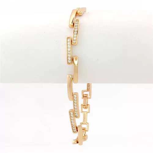 Aranyszínű antiallergén karkötő fehér kristályokkal