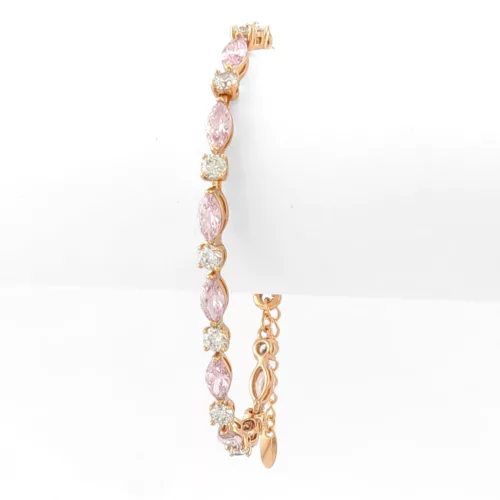 Aranyszínű antiallergén karkötő rózsaszín kristállyal