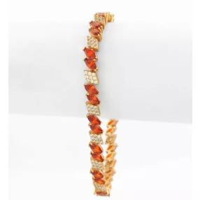 Aranyszínű antiallergén karkötő piros kristályokkal