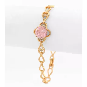   Aranyszínű antiallergén karkötő rózsaszín kristállyal