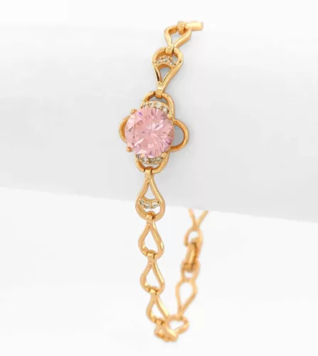 Aranyszínű antiallergén karkötő rózsaszín kristállyal