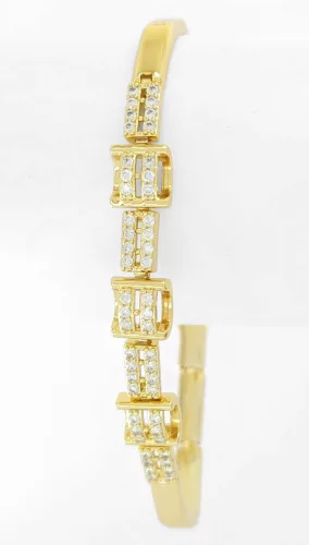 Aranysárga színű antiallergén karkötő fehér kristályokkal