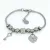 Ezüstszínű nemesacél pandora jellegű karkötő szívlakat és kulcs charmokkal