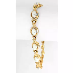   Aranyszínű antiallergén karkötő rózsaszín gyöngy díszítéssel